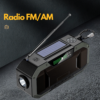 Radio portabil multifunctional, Bluetooth, Lanterna SOS, AM/FM, Afisaj digital, Incarcare prin cablu, manual si solar, Baterie 5000mAh